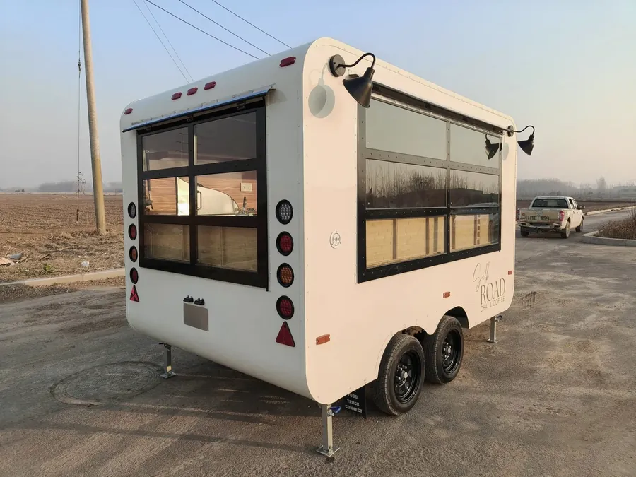 The Silk Road mobile coffee trailer parked outdoors at sunset