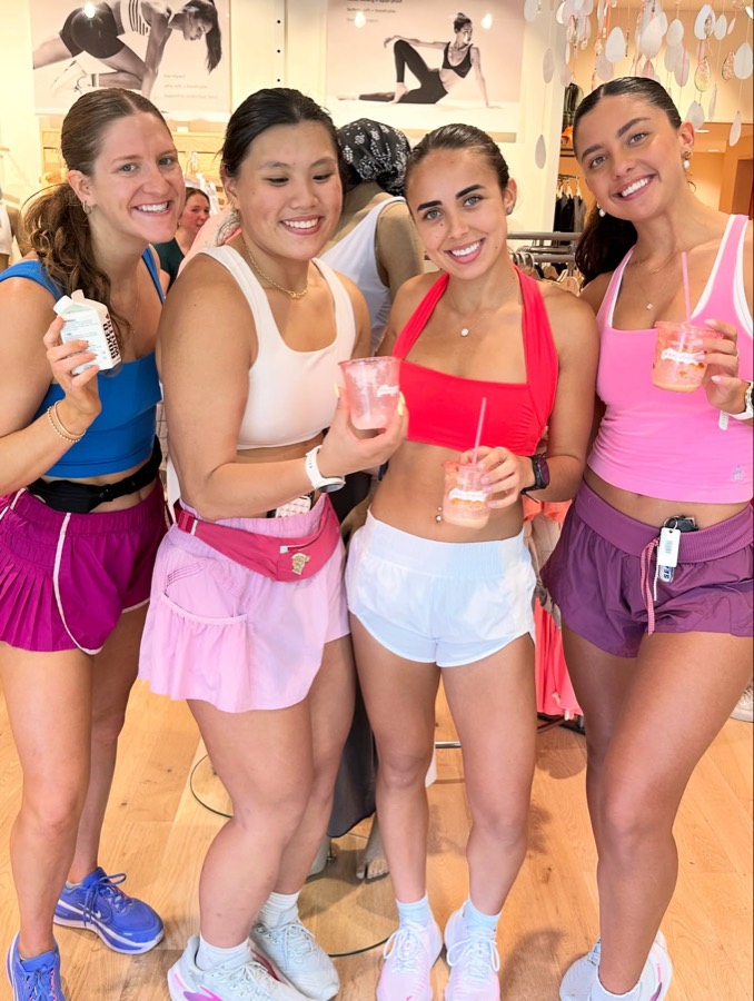Three runners holding Silk Road iced drinks after the FP Movement run