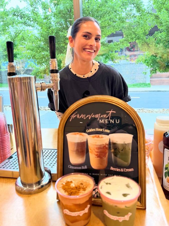 The co-branded FP Movement menu card beside four iced signature drinks